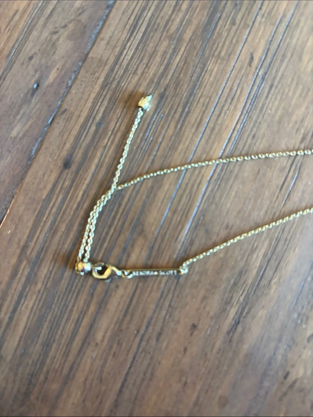 Kendra Scott Gold Star Necklace with Black Center